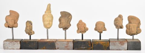 A collection of Indus valley pottery masks, figures and artefacts, probably 14th/15thC, tallest