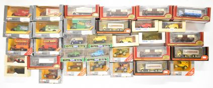 Thirty three Corgi Classics and Exclusive First Editions (EFE) diecast model trucks, vans and