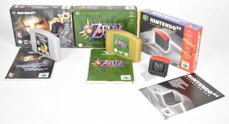 Two Nintendo 64 (N64) games The Legend of Zelda: Majora's Mask gold cartridge and Perfect Dark,