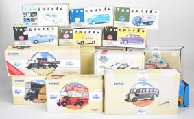 Sixteen Corgi and similar diecast model buses trucks and vans, all in original boxes.