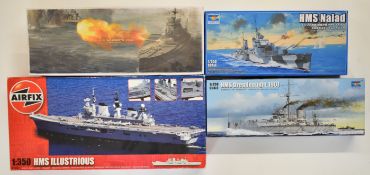 Four 1:350 scale plastic model battleship kits by Airfix, Trumpeter and Academy Plastic comprising