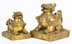 Two Chinese bronze Dog of Fo figures, tallest 10cm