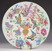 A 19thC Chinese celadon charger with relief moulded enamelled decoration of flora and fauna,