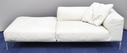 B&B Italia designer Italian leather sofa raised on tubular steel legs, with name stamped to the