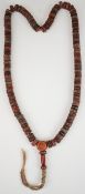 Tibetan mala prayer beaded necklace made from yak bone with inlaid turquoise and coral