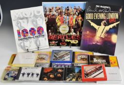 Beatles collectibles. Fourteen CD albums, three 3