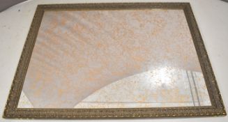 Large mirror with moulded frame and distressed glass, 140 x 187cm