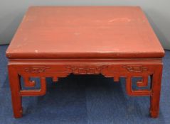 19thC Chinese jointed kang or low table with geometric supports and decoration, raised on square