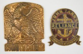 John Tanris safe plate reusing the Reliance insurance anchor symbol, and a bronze phoenix replica of