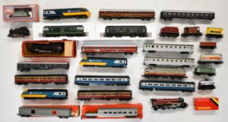 00 gauge model railway locomotives, carriages and goods wagons with manufactures including Hornby,
