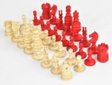 Nineteenth century carved bone chess set, height of king 7.5cm, in wooden box.