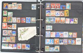 Album of world Cinderella stamps on the subject of Christmas, with labels from around the world