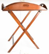 19th century mahogany butler's tray on stand, with fold up flaps incorporating handles, the hinged