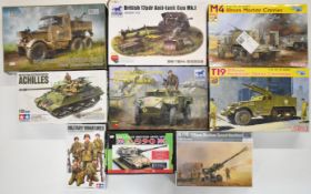 Nine 1:35 scale military related plastic model kits by Dragon, Tamiya, Trumpeter, Bronco and IBG