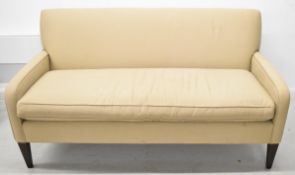 Workbench two seat sofa, raised on square tapering legs, length 163cm