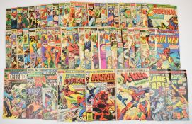 Fifty seven Bronze Age Marvel comics to include early Iron Man and X-Men issues and Daredevil #
