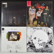 Fifteen Indie Rock LPs most in open shrink wrap. Radiohead A Moon Shaped Pool white vinyl, Joanna