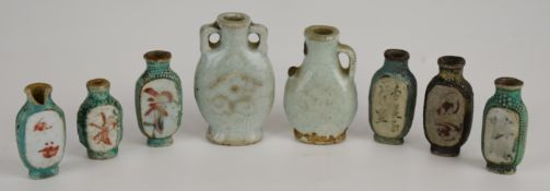 Eight 19th/20thC Chinese porcelain scent or snuff bottles including celadon ground examples, tallest