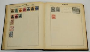 Triumph stamp album with all world stamps including USA parcel post and special delivery stamps,
