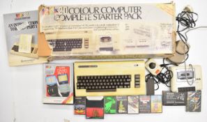 Commodore VIC-20 home computer starter pack with power supply, cassette unit, joystick and software,