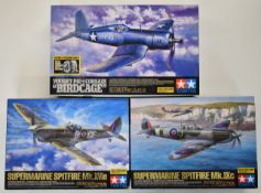 Three Tamiya 1:32 scale plastic model aircraft kits comprising Vought F4U-1 Corsair Birdcage