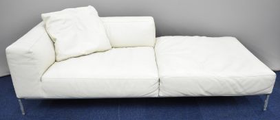 B&B Italia designer Italian leather sofa raised on tubular steel legs, with name stamped to the