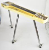 Dia lapsteel electric guitar with removable telescopic legs, length 78cm.