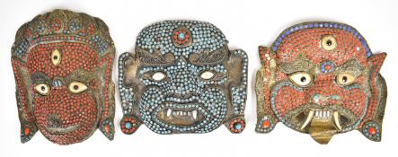 Three Tibetan / Nepalese Mahakala masks, tallest 21cm