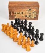 Milbro boxwood and ebony Staunton pattern chess set, height of king 7cm, in original box.