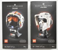Two Lego Star Wars The Helmet Collection sets comprising Scout Trooper 75305 and Luke Skywalker (Red