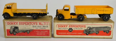 Two Dinky Supertoys diecast model haulage vehicles comprising Guy Flat Truck with Tailboard 513