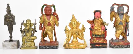 Six carved wood and bronze figures of Indian deities, tallest 16cm