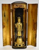 Gilt bronze figure of a Tibetan / Chinese Buddhist deity Guanyin, within a gilt and lacquer