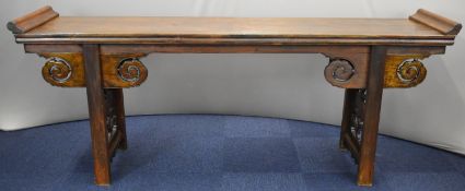 19thC stained elm and hardwood jointed Chinese altar table with scrolling fretwork decoration and