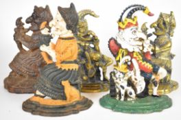 Five Punch and Judy cast iron and brass doorstops