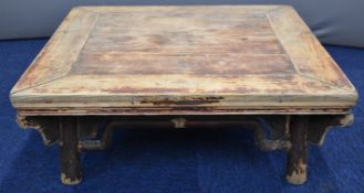 19thC Chinese jointed elm low table with moulded supports, raised on circular legs, W78 x D78 x