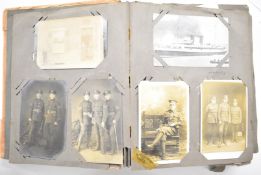 Album of over two hundred early to mid-century vintage postcards, many humour and comic seaside