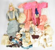 Late Victorian or Edwardian bisque headed doll with open mouth, tinted cheeks, weighted brown