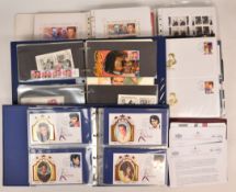 A large collection of Elvis Presley stamps in albums and album pages, includes worldwide sets and