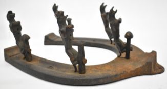Jaguar motor car interest coat rack formed as a horseshoe mounted with five leaping jaguar car