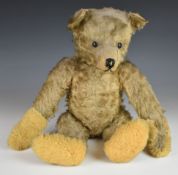 Early 20th century Bing Teddy bear with button under arm, hump to back, straw filled body, shaved