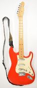 Fender Stratocaster style 'Partcaster' electric guitar in candy red finish.