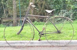Circa 1890 Victorian safety bicycle, the diamond frame not having a seat tube, with wooden handlebar