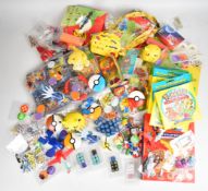 Pokémon TCG - A collection of related toys and merchandise to include trading cards, keyrings,