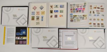 World stamp collection in three stock albums with three Cyprus yearbooks for the 50th Anniversary of