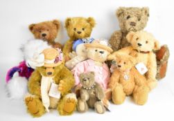 Nine Robin Rive and similar artist Teddy bears, the majority with original tags, tallest 53cm.