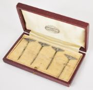 Cased set of four silver plated Bentley vintage, pre-war or classic car interest cocktail sticks, in
