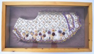 Oshibana style dried flower embroidery artwork of a half waistcoat inspired by Beatrix Potter's