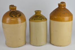 Three stoneware flagons / jars for Arnold Perrett, Wickwar; Washbourn Brothers, Gloucester and W H