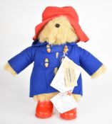 Gabrielle Designs Paddington Bear with red felt hat, blue duffle coat, blue wellington boots and